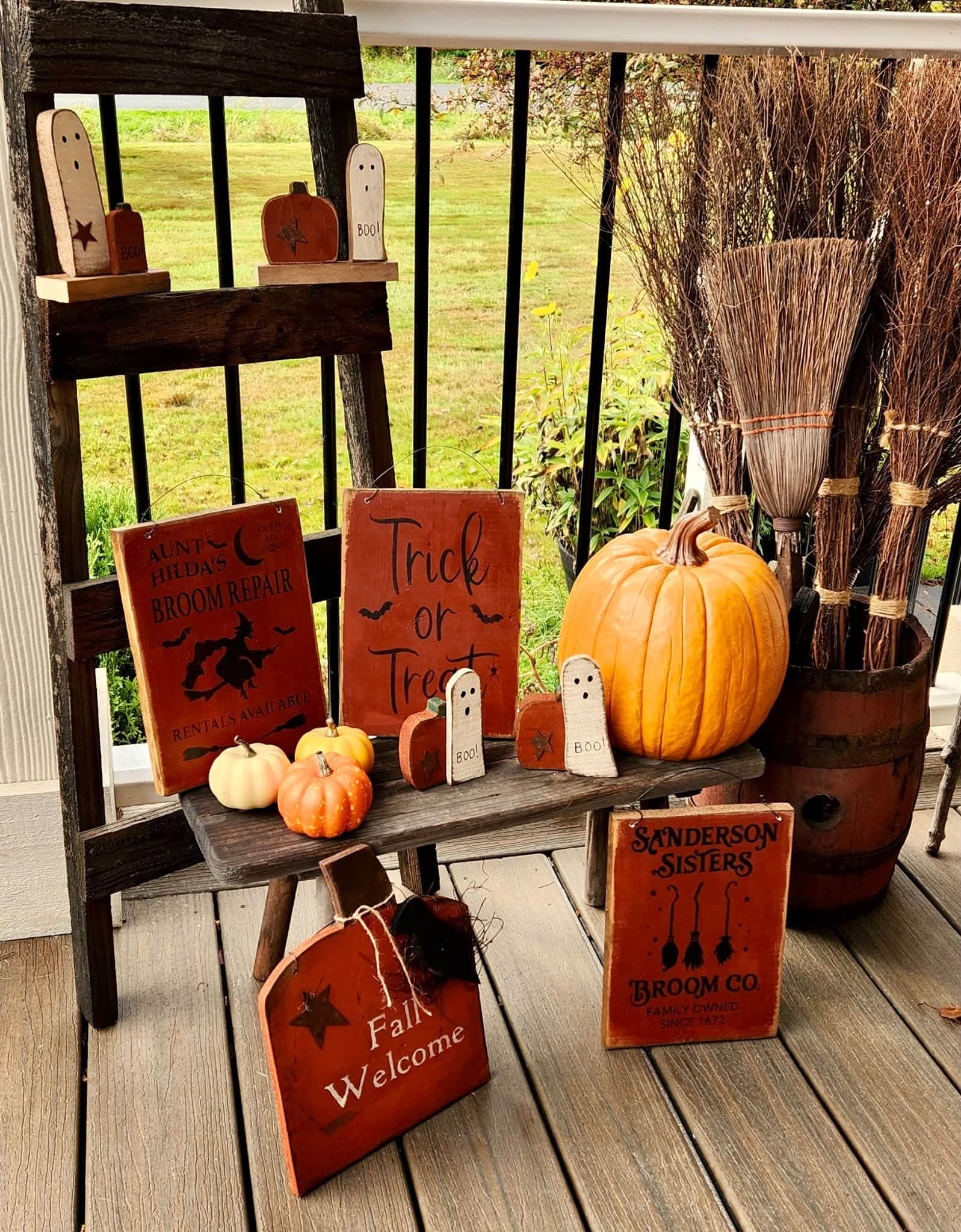 Wooden benches and hand-lettered primitive signs styled on a porch